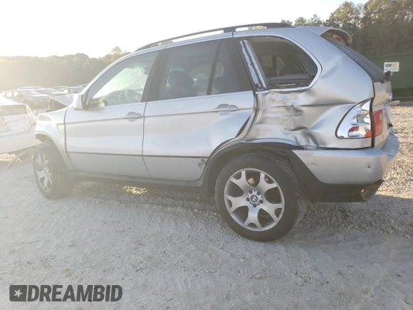 2000 BMW X5 4.4i with VIN WBAFB3355YLH05755, listed as a Copart auction lot 77136744 with 0 mi miles and Salvage Title. Bid and sale history available at carsss.com. Image 2.