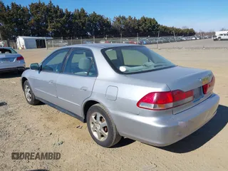 2002 Honda Accord EX z VIN 1HGCG56542A144609, wystawiony jako IAAI lot #41706668 z przebiegiem 220 536 mil mil oraz . Historia ofert i sprzedaży dostępna na DreamBid. Obrazek 3.