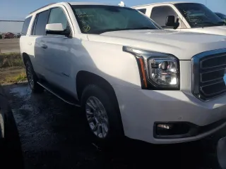 2019 GMC Yukon SLT with VIN 1GKS1BKC3KR243006, listed as a Copart auction lot 74732484 with 28,756 mi miles and Non Repairable. Bid and sale history available at carsss.com. Image 4.