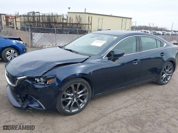 2016 Mazda Mazda6 i Grand Touring with VIN JM1GJ1W57G1486962, listed as a IAAI auction lot 41813471 with 64,078 mi miles. Bid and sale history available at carsss.com. Image 2.