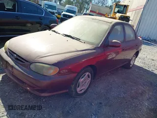 2001 Kia Sephia z VIN KNAFB121715045535, wystawiony jako IAAI lot #41765390 z przebiegiem 128 815 mil mil oraz . Historia ofert i sprzedaży dostępna na DreamBid. Obrazek 2.