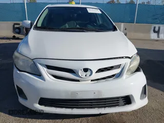 2011 Toyota Corolla L with VIN 2T1BU4EE7BC672168, listed as a IAAI auction lot 41735610 with 168,274 mi miles. Bid and sale history available at carsss.com. Image 12.