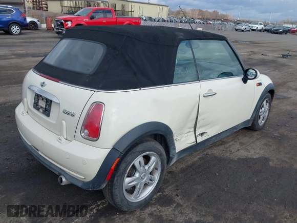 2006 MINI Convertible with VIN WMWRF33566TF65410, listed as a IAAI auction lot 40813052 with 131,109 mi miles and . Bid and sale history available at DreamBid. Image 4.