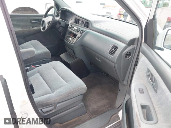2001 Honda Odyssey EX z VIN 2HKRL18661H566973, wystawiony jako IAAI lot #42117015 z przebiegiem 206 999 mil mil oraz . Historia ofert i sprzedaży dostępna na DreamBid. Obrazek 5.