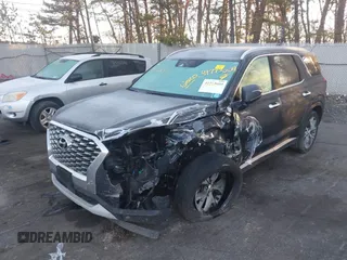 2020 Hyundai Palisade SEL z VIN KM8R4DHEXLU078992, wystawiony jako IAAI lot #41773009 z przebiegiem 69 319 mil mil oraz . Historia ofert i sprzedaży dostępna na DreamBid. Obrazek 2.