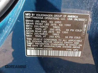 2022 Volkswagen Atlas SE z VIN 1V2HE2CA4NC220203, wystawiony jako IAAI lot #41982896 z przebiegiem 61 989 mil mil oraz . Historia ofert i sprzedaży dostępna na DreamBid. Obrazek 9.