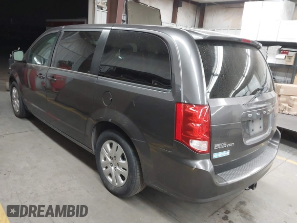 2018 Dodge Grand Caravan SE with VIN 2C4RDGBG8JR230875, listed as a IAAI auction lot 42062774 with 194,781 mi miles and . Bid and sale history available at DreamBid. Image 3.