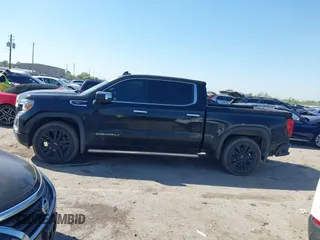 2020 GMC Sierra 1500 Denali with VIN 1GTU9FEL0LZ369793, listed as a IAAI auction lot 41870341 with 81,959 mi miles and . Bid and sale history available at DreamBid. Image 14.