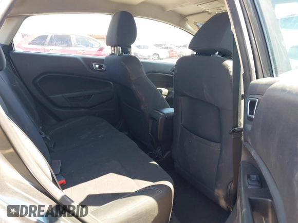 2015 Ford Fiesta SE with VIN 3FADP4BJ1FM217045, listed as a IAAI auction lot 42120444 with 119,207 mi miles and . Bid and sale history available at DreamBid. Image 8.