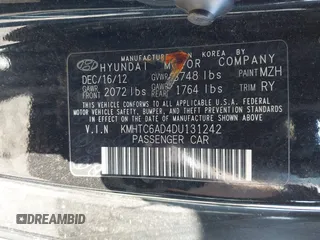 2013 Hyundai Veloster w/Gray Int with VIN KMHTC6AD4DU131242, listed as a IAAI auction lot 42074517 with 76,713 mi miles and . Bid and sale history available at DreamBid. Image 9.