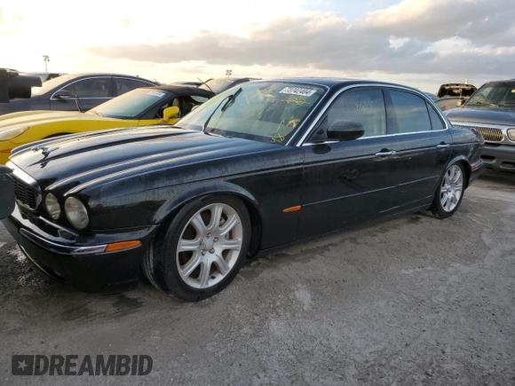 2004 Jaguar XJ with VIN SAJWA71C04SG31354, listed as a Copart auction lot 73742404 with 0 mi miles and Non Repairable. Bid and sale history available at carsss.com. Image 1.
