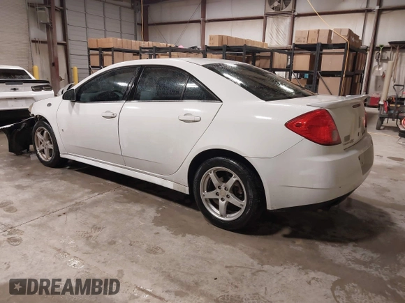 2009 Pontiac G6 1SB z VIN 1G2ZJ57K494243961, wystawiony jako IAAI lot #41560966 z przebiegiem 210 819 mil mil oraz . Historia ofert i sprzedaży dostępna na DreamBid. Obrazek 3.