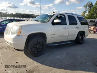 2014 GMC Yukon Denali with VIN 1GKS2EEF0ER141638, listed as a Copart auction lot 74247634 with 160,671 mi miles and Salvage Title. Bid and sale history available at carsss.com. Image 1.