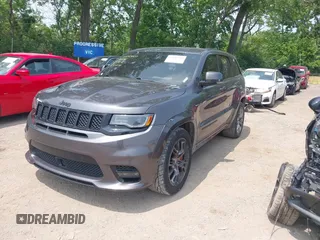 2018 Jeep Grand Cherokee SRT z VIN 1C4RJFDJ7JC281644, wystawiony jako IAAI lot #42481239 z przebiegiem 160 218 mil mil oraz . Historia ofert i sprzedaży dostępna na DreamBid. Obrazek 18.