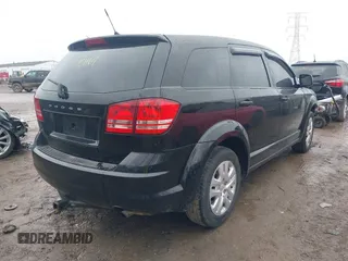 2014 Dodge Journey SE with VIN 3C4PDCAB8ET151666, listed as a IAAI auction lot 41721164 with 262,991 mi miles and . Bid and sale history available at carsss.com. Image 4.