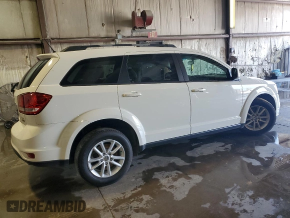 2017 Dodge Journey SXT with VIN 3C4PDCBG0HT572165, listed as a Copart auction lot 56673495 with Not provided miles and Salvage title. Bid and sale history available at DreamBid. Image 3.