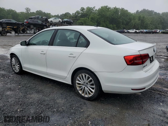 2015 Volkswagen Jetta SE with VIN 3VWD17AJ9FM233571, listed as a Copart auction lot 61436735 with 58,690 mi miles and Salvage title. Bid and sale history available at DreamBid. Image 2.