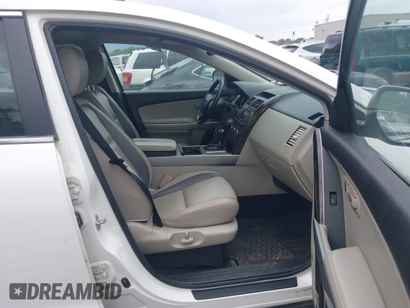 2012 Mazda CX-9 Grand Touring with VIN JM3TB3DA1C0356335, listed as a IAAI auction lot 42658284 with 141,537 mi miles and . Bid and sale history available at DreamBid. Image 5.