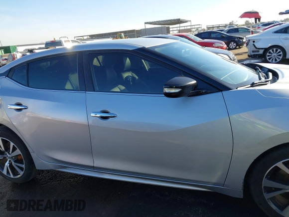 2017 Nissan Maxima SV with VIN 1N4AA6AP9HC371030, listed as a IAAI auction lot 40904703 with 160,859 mi miles and . Bid and sale history available at DreamBid. Image 14.