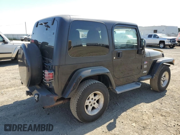 2004 Jeep Wrangler Sahara with VIN 1J4FA59SX4P718591, listed as a Copart auction lot 59907805 with 241,994 mi miles and Clean title. Bid and sale history available at DreamBid. Image 3.
