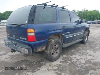2003 Chevrolet Tahoe LS z VIN 1GNEK13T73J244424, wystawiony jako IAAI lot #42284777 z przebiegiem 233 833 mil mil oraz . Historia ofert i sprzedaży dostępna na DreamBid. Obrazek 4.