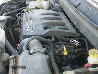 2013 Dodge Journey American Value z VIN 3C4PDCAB5DT687666, wystawiony jako IAAI lot #42809881 z przebiegiem 204 183 mil mil oraz . Historia ofert i sprzedaży dostępna na DreamBid. Obrazek 17.