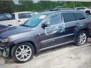 2015 Jeep Grand Cherokee Summit with VIN 1C4RJFJG0FC611768, listed as a IAAI auction lot 42468497 with 217,032 mi miles and . Bid and sale history available at DreamBid. Image 2.