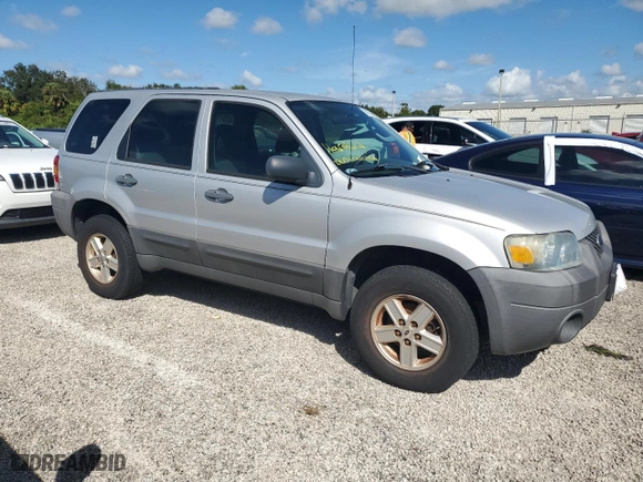 2007 Ford Escape XLS with VIN 1FMCU02Z07KB36040, listed as a Copart auction lot 74043354 with 0 mi miles and Salvage Title. Bid and sale history available at carsss.com. Image 4.
