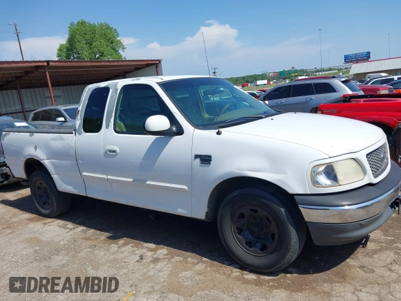 2001 Ford F-150 z VIN 1FTPX17LX1KB15016, wystawiony jako IAAI lot #42320637 z przebiegiem 567 424 mil mil oraz . Historia ofert i sprzedaży dostępna na DreamBid. Obrazek 14.