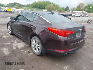 2011 Kia Optima EX with VIN KNAGN4A69B5148919, listed as a IAAI auction lot 42133805 with 112,114 mi miles and . Bid and sale history available at carsss.com. Image 3.