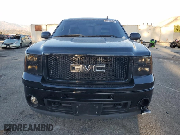 2011 GMC Sierra 1500 Work Truck z VIN 1GTN1TE01BZ402203, wystawiony jako Copart lot #86602954 z przebiegiem 145 144 mil mil oraz Szkody całkowita. Historia ofert i sprzedaży dostępna na DreamBid. Obrazek 5.