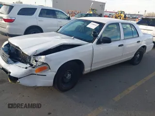 2000 Ford Crown Victoria Police Police Interceptor with VIN 2FAFP71W9YX149303, listed as a IAAI auction lot 41888402 with 148,081 mi miles. Bid and sale history available at carsss.com. Image 2.