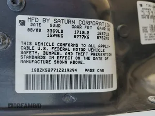 2001 Saturn SL z VIN 1G8ZK52771Z219294, wystawiony jako Copart lot #83155494 z przebiegiem 190 338 mil mil oraz Szkody całkowita. Historia ofert i sprzedaży dostępna na DreamBid. Obrazek 12.