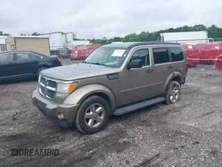 2007 Dodge Nitro SLT z VIN 1D8GT58K07W735904, wystawiony jako IAAI lot #42216665 z przebiegiem 168 000 mil mil oraz . Historia ofert i sprzedaży dostępna na DreamBid. Obrazek 2.