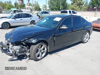 2014 BMW 3 Series 328i with VIN WBA3C1C54EK112620, listed as a IAAI auction lot 42712414 with 169,297 mi miles and . Bid and sale history available at DreamBid. Image 2.