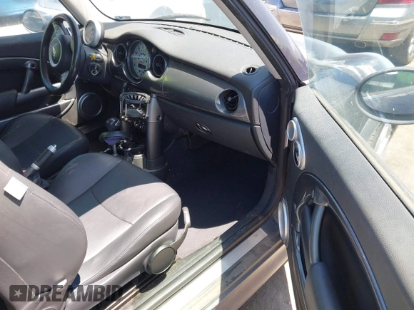 2006 MINI Hardtop S with VIN WMWRE33536TJ35740, listed as a IAAI auction lot 42720196 with 165,852 mi miles and . Bid and sale history available at DreamBid. Image 5.