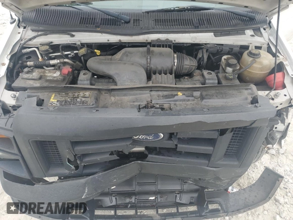 2010 Ford Econoline Cargo Commercial with VIN 1FTNE2EW5ADA87906, listed as a Copart auction lot 70585604 with 302,164 mi miles and Salvage title. Bid and sale history available at DreamBid. Image 13.
