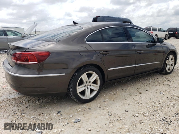 2014 Volkswagen CC R-Line with VIN WVWBN7ANXEE507477, listed as a Copart auction lot 58546374 with 73,792 mi miles and Salvage Title. Bid and sale history available at carsss.com. Image 3.