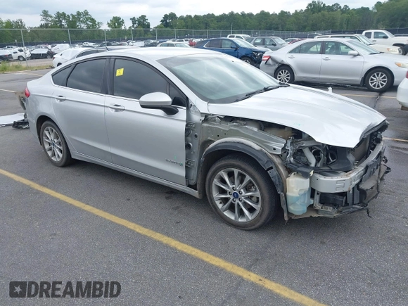 2017 Ford Fusion Hybrid SE with VIN 3FA6P0LU2HR317784, listed as a IAAI auction lot 42618554 with 114,814 mi miles and . Bid and sale history available at DreamBid. Image 1.