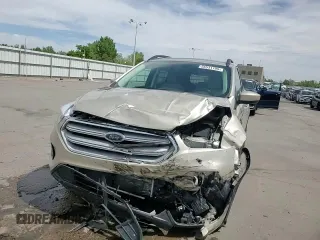 2018 Ford Escape SE z VIN 1FMCU9GD5JUC08024, wystawiony jako Copart lot #56531105 z przebiegiem 54 104 mil mil oraz Szkoda całkowita • Salvage title. Historia ofert i sprzedaży dostępna na DreamBid. Obrazek 15.