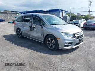 2019 Honda Odyssey Touring z VIN 5FNRL6H81KB070459, wystawiony jako IAAI lot #41590762 z przebiegiem 61 219 mil mil oraz . Historia ofert i sprzedaży dostępna na DreamBid. Obrazek 1.