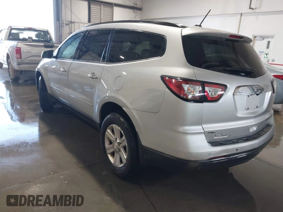 2013 Chevrolet Traverse LT with VIN 1GNKVGKDXDJ219140, listed as a IAAI auction lot 41702625 with 223,440 mi miles and . Bid and sale history available at DreamBid. Image 3.