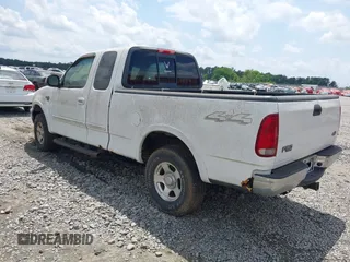 2003 Ford F-150 XL z VIN 1FTRX18W03NA25313, wystawiony jako IAAI lot #42147555 z przebiegiem 143 837 mil mil oraz . Historia ofert i sprzedaży dostępna na DreamBid. Obrazek 3.