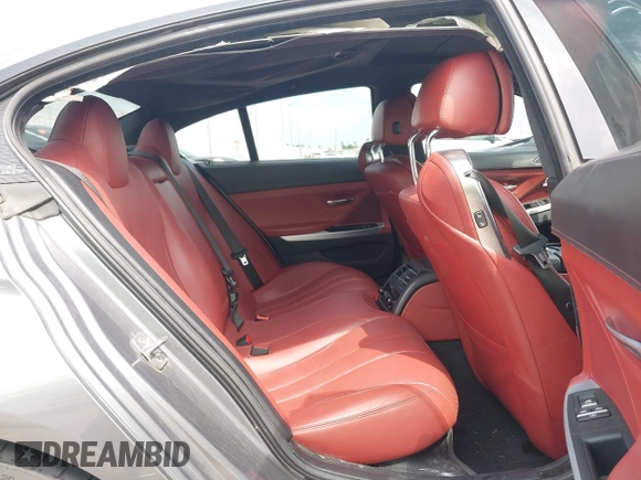 2014 BMW 6 Series 650i z VIN WBA6B2C55ED128934, wystawiony jako IAAI lot #42070641 z przebiegiem 102 597 mil mil oraz . Historia ofert i sprzedaży dostępna na DreamBid. Obrazek 8.