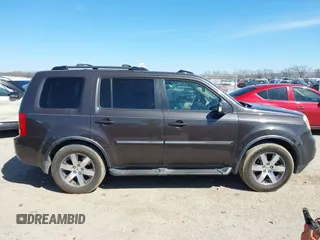 2012 Honda Pilot Touring with VIN 5FNYF4H99CB069996, listed as a IAAI auction lot 41809046 with 140,836 mi miles and . Bid and sale history available at DreamBid. Image 13.