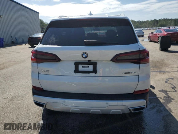 2021 BMW X5 xDrive40i z VIN 5UXCR6C0XM9E49285, wystawiony jako Copart lot #60897325 z przebiegiem 57 314 mil mil oraz Szkoda całkowita • Salvage title. Historia ofert i sprzedaży dostępna na DreamBid. Obrazek 6.