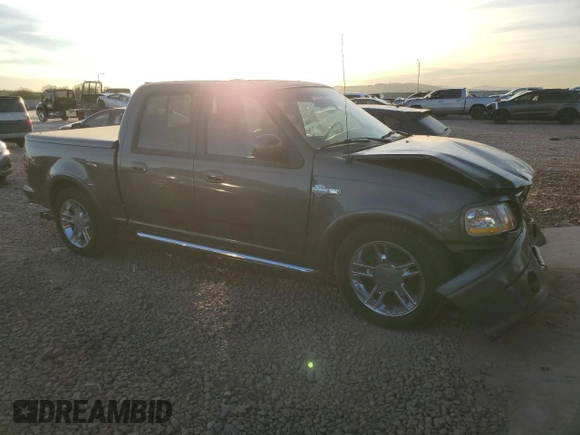 2002 Ford F-150 Harley Davidson with VIN 1FTRW07332KE04049, listed as a Copart auction lot 84742654 with 287,346 mi miles and Salvage Title. Bid and sale history available at carsss.com. Image 4.