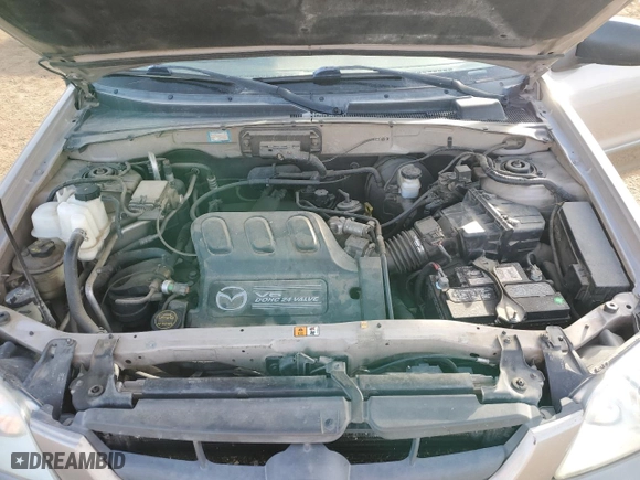2002 Mazda Tribute LX with VIN 4F2YU08162KM59948, listed as a Copart auction lot 84931714 with 210,808 mi miles and Salvage Title. Bid and sale history available at carsss.com. Image 12.