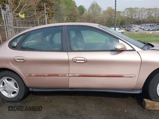1997 Ford Taurus GL z VIN 1FALP52U2VA273762, wystawiony jako IAAI lot #41956536 z przebiegiem 177 340 mil mil oraz . Historia ofert i sprzedaży dostępna na DreamBid. Obrazek 13.