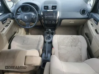 2013 Suzuki SX4 LE with VIN JS2YC5A37D6101979, listed as a Copart auction lot 42185855 with 118,855 mi miles and Salvage Title. Bid and sale history available at carsss.com. Image 8.